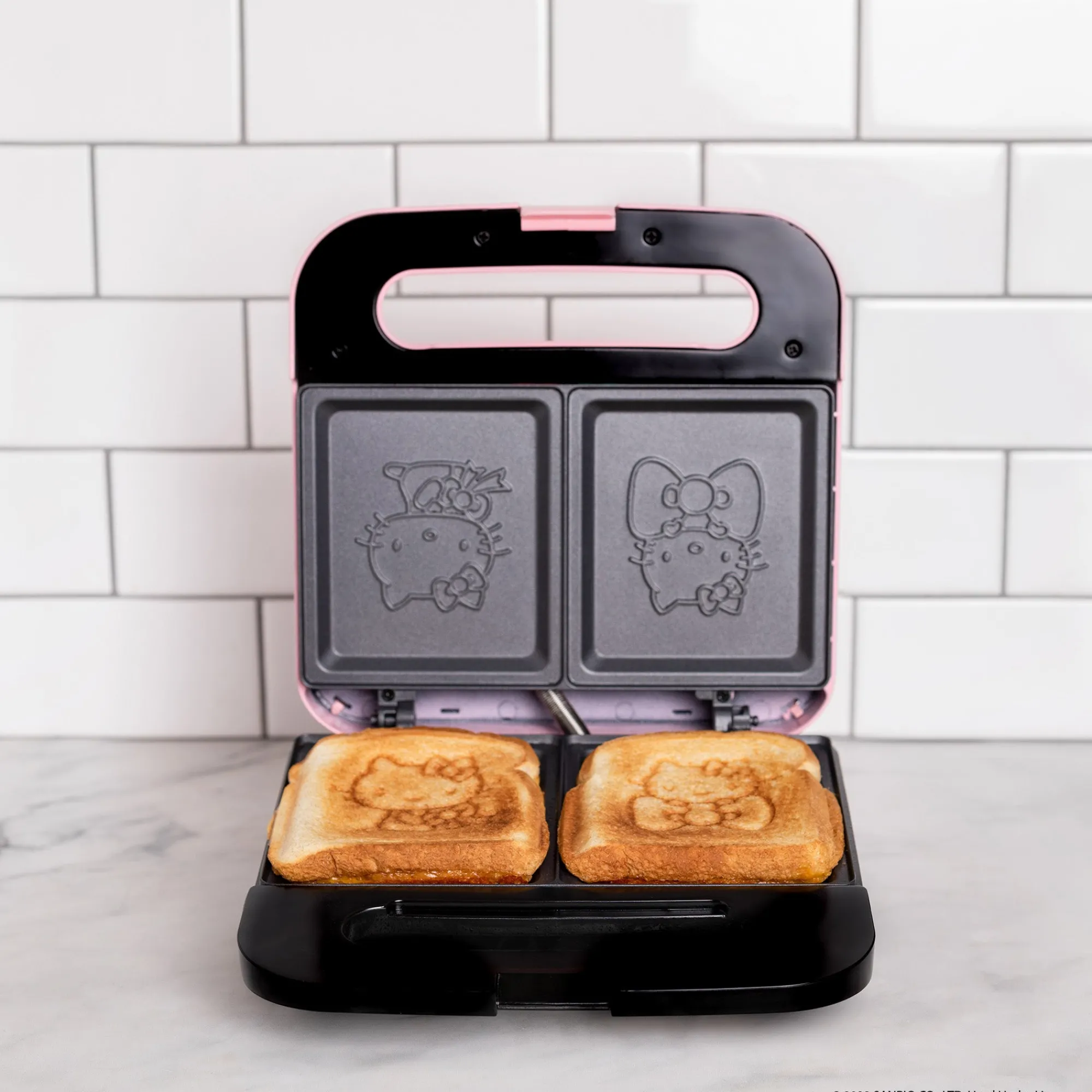 Uncanny Brands Wholesale Hello Kitty Bow Sandwich Maker (Pink)